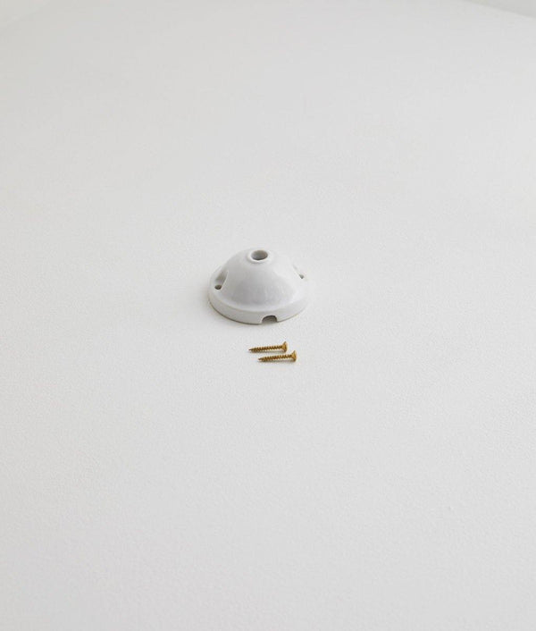 Rosace bombée en porcelaine émaillée blanche
